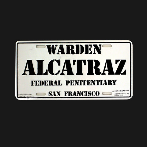 A full size license plate with "Warden Alcatraz Federal Penitentiary San Francisco" 