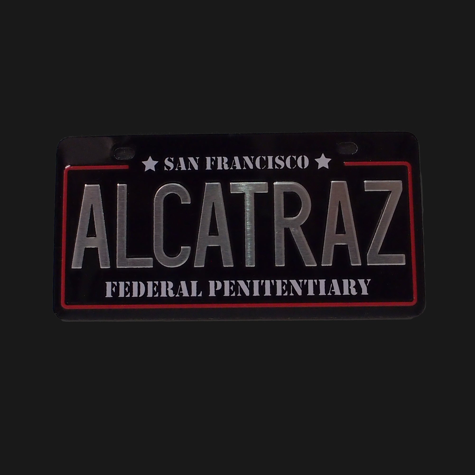 Alcatraz Federal Penitentiary Mini license plate shape magnet. 1.5" Height x 3" Width