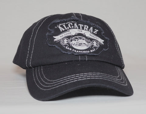 Denim baseball cap with "Alcatraz No Good for Nobody, San Francisco Bay" patch on the front. Color denim black.
