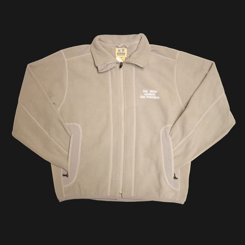 Light Grey full zip fleece jacket with "The Rock Alcatraz San Francisco" on the front left chest.
