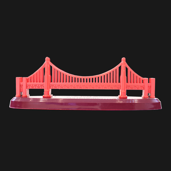 A model of the Golden Gate Bridge on a stand.