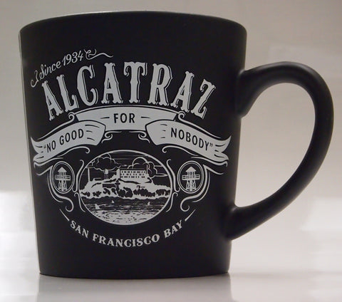 Large Black Taper Ceramic Coffee Mug with "Alcatraz No Good For Nobody" logo.