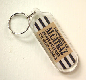Oblong Plastic Keychain with Property of Alcatraz Penitentiary printed on front and back