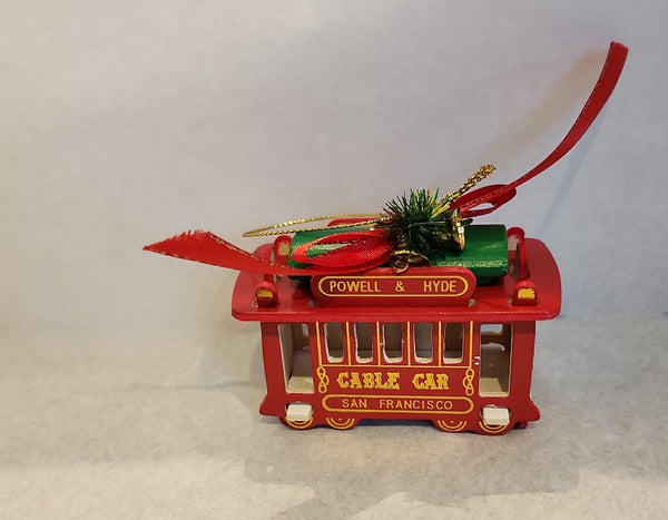 San Francisoc Cable Car Christmas Ornament. Red with red ribbon bow.