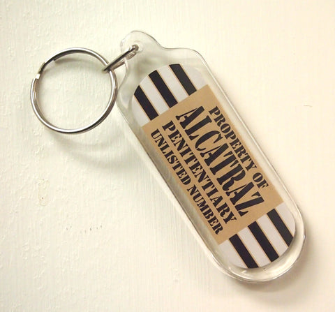 Oblong Plastic Keychain with Property of Alcatraz Penitentiary printed on front and back